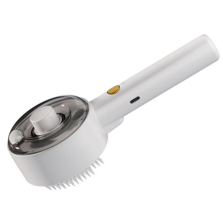 Vit pälsborste med vattenspray