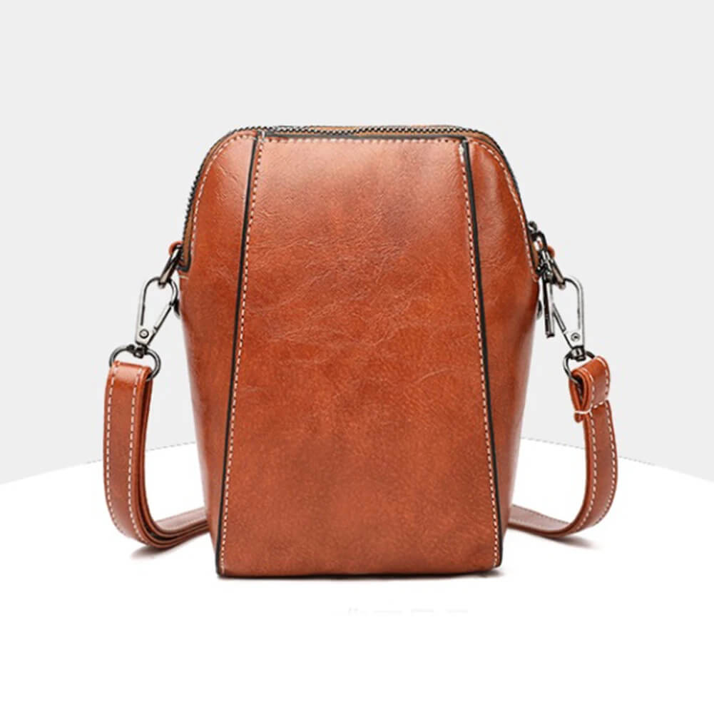 Vintage Crossbody Läderväska för Kvinnor - Justerbar Axelrem, Kompakt Design och Elegant Stil